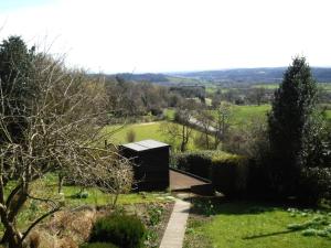 a small house in the middle of a garden at 1 Bed in Ampleforth oc-b34674 in Ampleforth