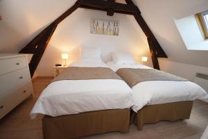 Katil atau katil-katil dalam bilik di Le Clos Saint Martin