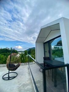 En balkon eller terrasse på รามโรมวัลเลย์รีสอร์ท Ramrom Valley Resort