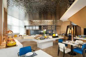 Khu vực ghế ngồi tại Fairfield by Marriott Qingdao West Coast