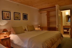 Postelja oz. postelje v sobi nastanitve Hotel y Cabañas Borde Andino