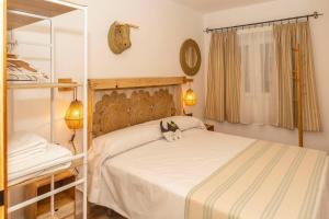 En eller flere senge i et værelse på Cortijillo La molinera