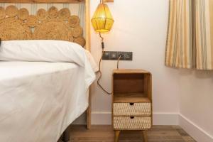 En eller flere senge i et værelse på Cortijillo La molinera + 14 billeder