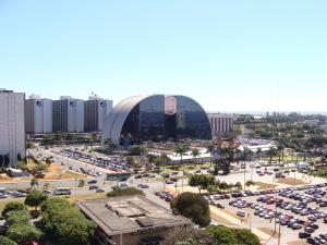 an aerial view of a parking lot in a city at Brasilia Apart Hotéis in Brasilia