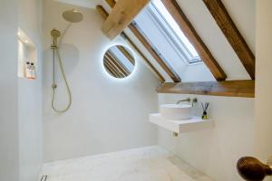 a bathroom with a shower and a sink at 3 Bed in Dulas oc-g34082 in Longtown