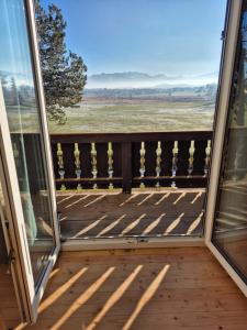 a view from the balcony of a house at The Staffelsee Lodge in Uffing