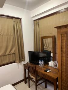 Et tv og/eller underholdning på De Mansion Hotels