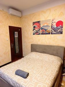 Giường trong phòng chung tại Eden Guesthouse