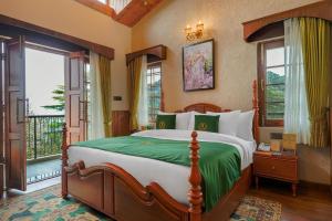 En eller flere senge i et værelse på BluSalzz Terrah Hills Resort, Dalhousie