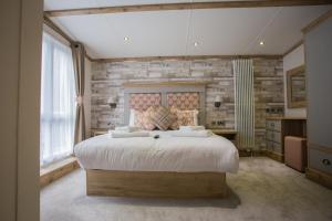 Postel nebo postele na pokoji v ubytování Mill Rythe Coastal Village