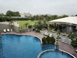 an overhead view of a swimming pool at a resort at Love Kush Hotel in Kishangarh