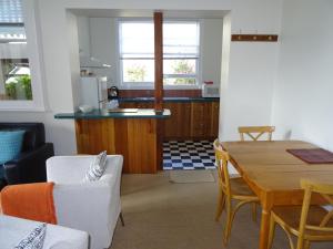 Η κουζίνα ή μικρή κουζίνα στο Highbury Apartments