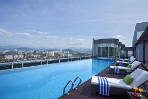 a swimming pool on the roof of a building at Somerset Kuala Lumpur in Kuala Lumpur