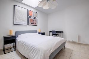 En eller flere senge i et værelse på la tribu