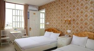 Fotografie z fotogalerie ubytování Royal Hotel v destinaci Phước Hậu (1)