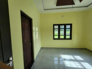 an empty room with a door and a window at Golden in Kaup