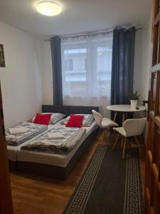 En eller flere senge i et værelse på Na Górce W Białym Dunajcu