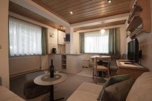 Et tv og/eller underholdning på Appartements Charlotte