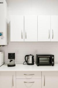 Køkken eller tekøkken på Alojamiento Baeza- El Limonero A