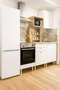 Nhà bếp/bếp nhỏ tại Alojamiento Baeza - Leones 9B