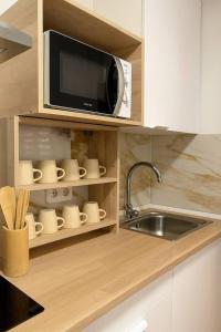 Nhà bếp/bếp nhỏ tại Alojamiento Baeza - Leones 9B +14 ảnh