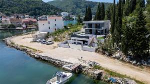 an aerial view of a house next to a river at Villa Juma by Villas Guide in Blace