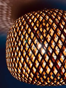 a close up of a straw hat with water at Grande maison de ville MALO LEONE 250m2 pour 15 personnes proche du Puy du Fou in Mauléon +99 photos