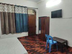 En eller flere senge i et værelse på Hotel O Vip Stay Inn + 11 billeder