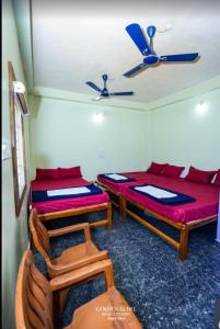 En eller flere senge i et værelse på Golden Kudle Beach Resort