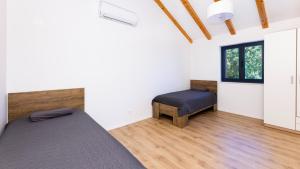 Postel nebo postele na pokoji v ubytování Villa Teuta by Villas Guide + 24 fotografií