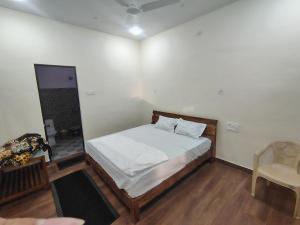 Giường trong phòng chung tại Marrion Blue - The Eco Paradise