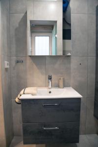 Et badeværelse på Homeyfeel Stay Sea 1 - Modern studio next to the sea! + 35 billeder