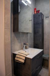 Et badeværelse på Homeyfeel Stay Sea 1 - Modern studio next to the sea!