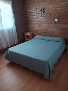 En eller flere senge i et værelse på La Posada De Vito