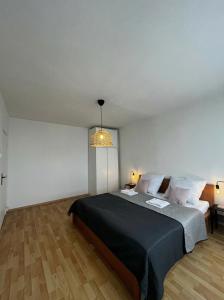 En eller flere senge i et værelse på 2-izbový apartmán s výhľadom