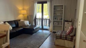 Posezení v ubytování Appartamento San Pellegrino