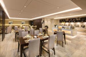 A restaurant or other place to eat at Ascott TEDA MSD Tianjin