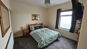 Postel nebo postele na pokoji v ubytování Charming 3-Bedroom Home in Doncaster, Perfect for Family, Friends Contractors