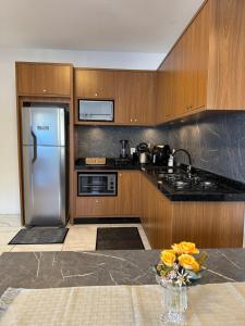 Kuchyň nebo kuchyňský kout v ubytování Casa 700m do mar Penha SC