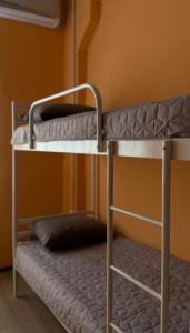 a couple of bunk beds in a room at Трініті Хаус in Kyiv