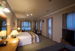 O cameră la Formosa Corridor Hotel