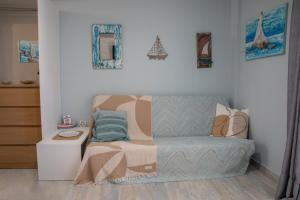 Posezení v ubytování Homeyfeel Stay Sea 2 - Island mood studio