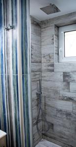 Koupelna v ubytování Homeyfeel Stay Sea 2 - Island mood studio + 27 fotografií