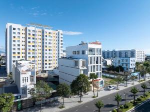 an aerial view of a city with tall buildings at Som Phu Quy 3 Hotel Phan Rang in Phan Rang–Tháp Chàm