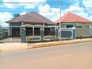 a house on the side of the street at Mwisenix apartment in Kigali