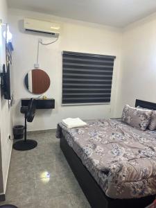 Postel nebo postele na pokoji v ubytování Sam Apartment