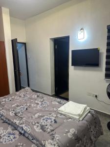 Postel nebo postele na pokoji v ubytování Sam Apartment