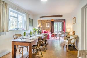 a dining room with a table and chairs at 3 Bed in Awre oc-s34503 in Awre