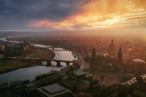 a view of a city with a river and a bridge at Hotel Indigo Dresden - Wettiner Platz by IHG in Dresden