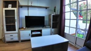 TV/trung tâm giải trí tại Apartalux Diamond Oasis